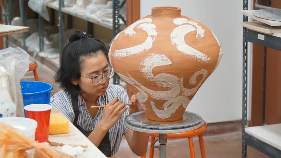 Participants handbuilding pottery at Afternoon Clay