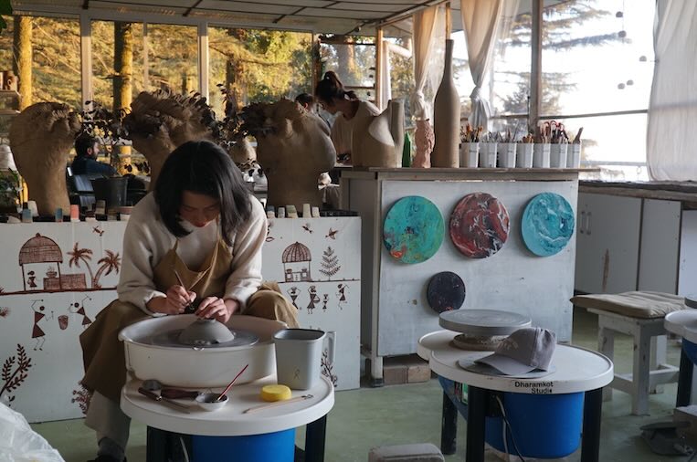 Handmade beginner pottery pieces drying