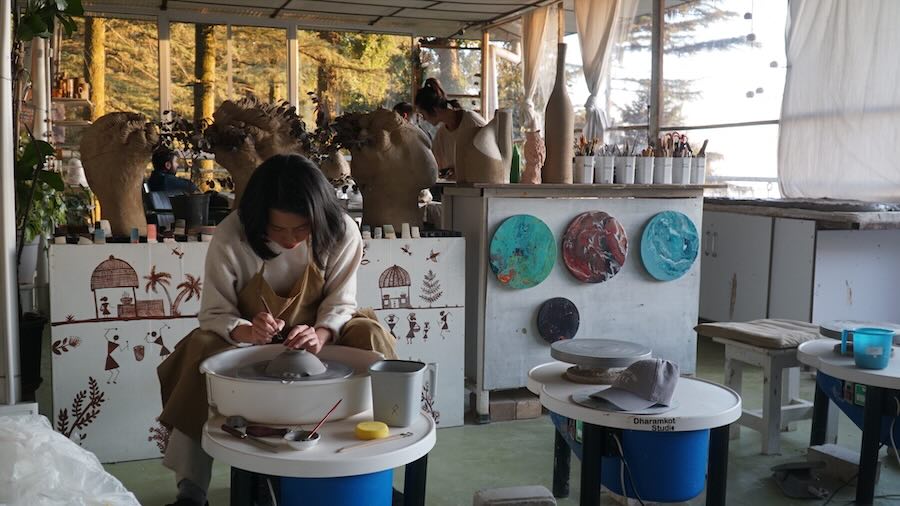 Participants handbuilding pottery at Evening Clay