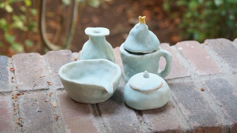 Participants working on pottery