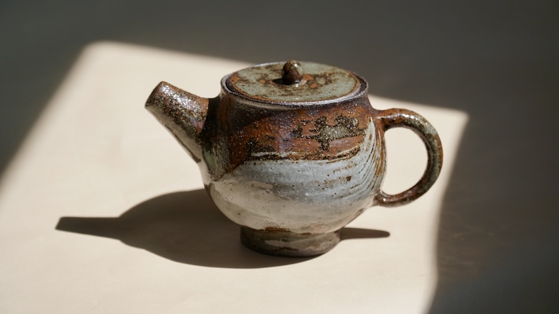 Wabi-sabi style pottery with Hakeme brush strokes